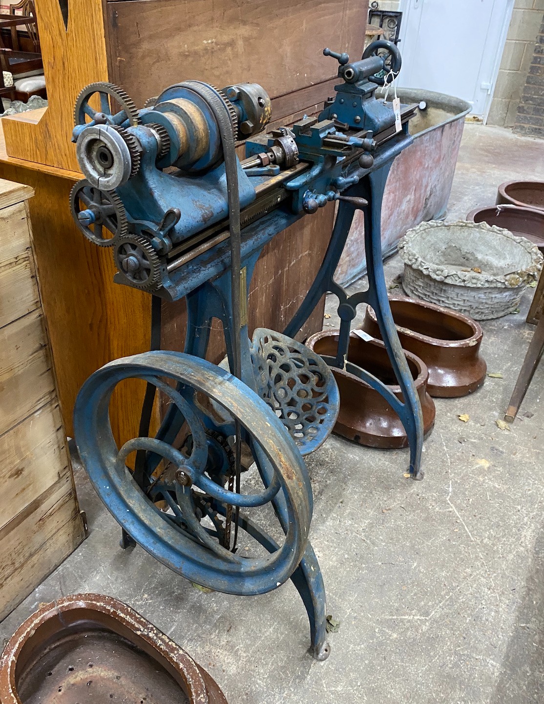 A Myford metalworkers lathe, with a three jaw chuck, width 108cm, height 116cm